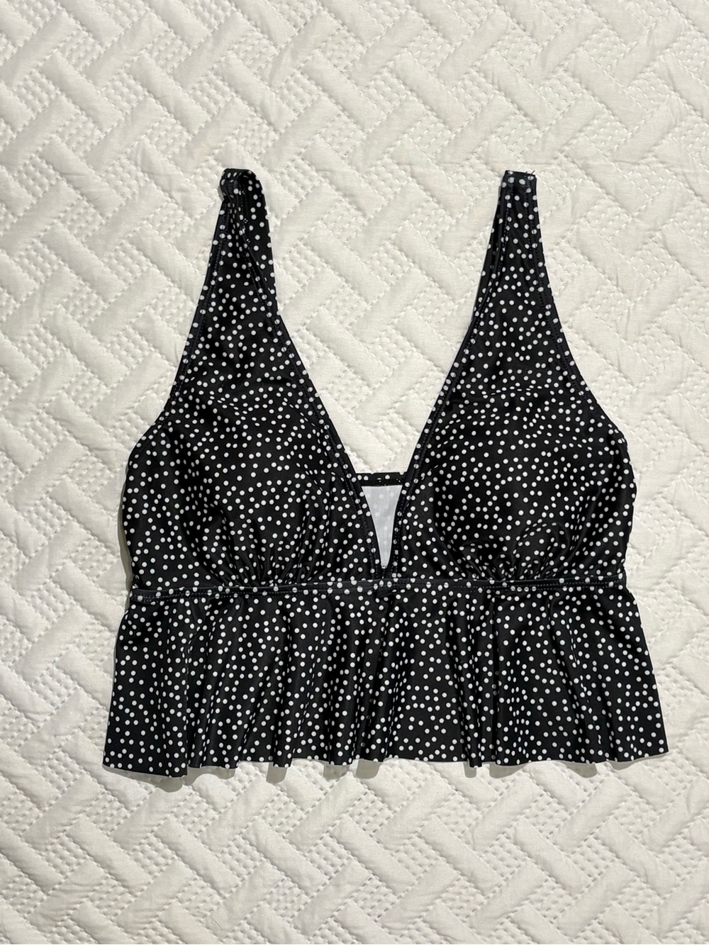 polka dot tankini top deep v-neck, adjustable straps, & a ruffled hem